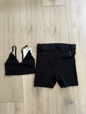 Jacquemus Black Ribbed Knit Top and Shorts Set with gold logo embellishments. XS